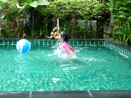 Girl playing in pool