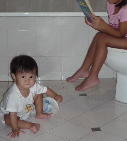 Girl taking a dump