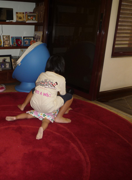 Look at what she is doing